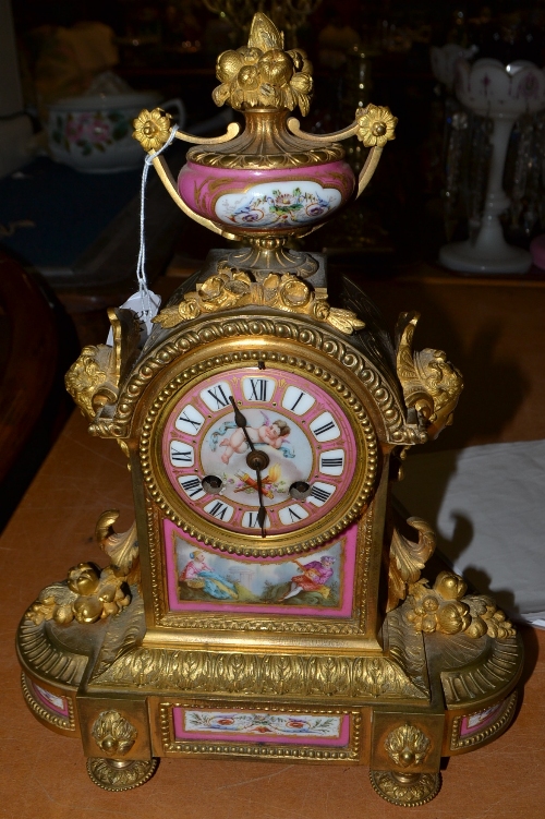 Late 19th century Louis XV style mantel clock with pink Sevres-style porcelain mounts