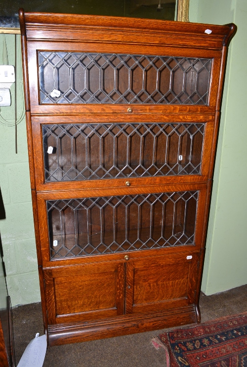 Gunn Furniture Co Michigan three height bookcase with leaded glass doors