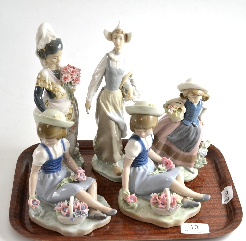 Five Lladro figures comprising a girl with basket of flowers (x2), girl with bouquet of flowers,