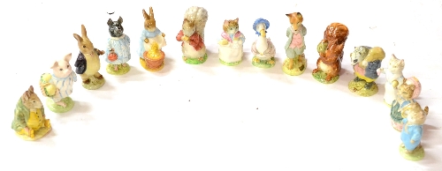 Beswick Beatrix Potter Figures comprising: `Tommy Brock`, `Squirrel Nutkin`, `Foxy Whiskered