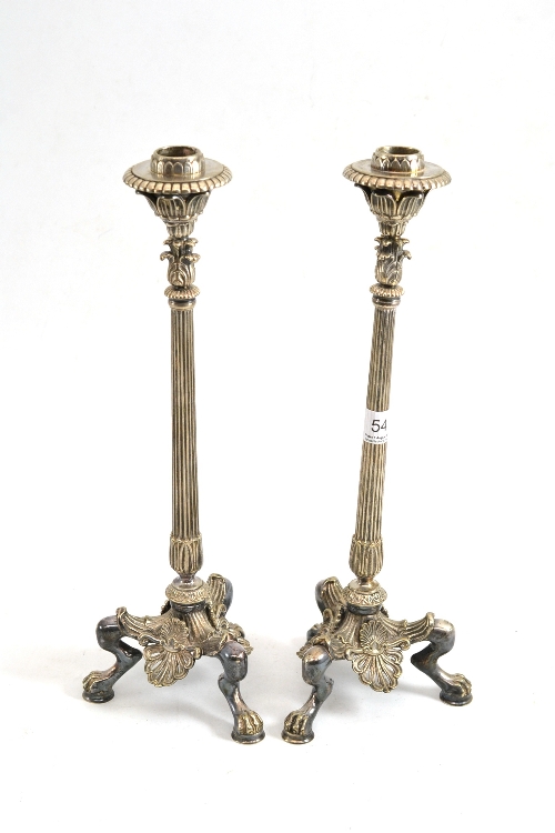 A pair of silver plated candlesticks in the Rococo style with screw-off sconces and bayonet action