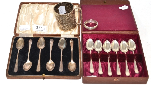 Two sets of silver teaspoons, a Victorian silver mug and a napkin ring