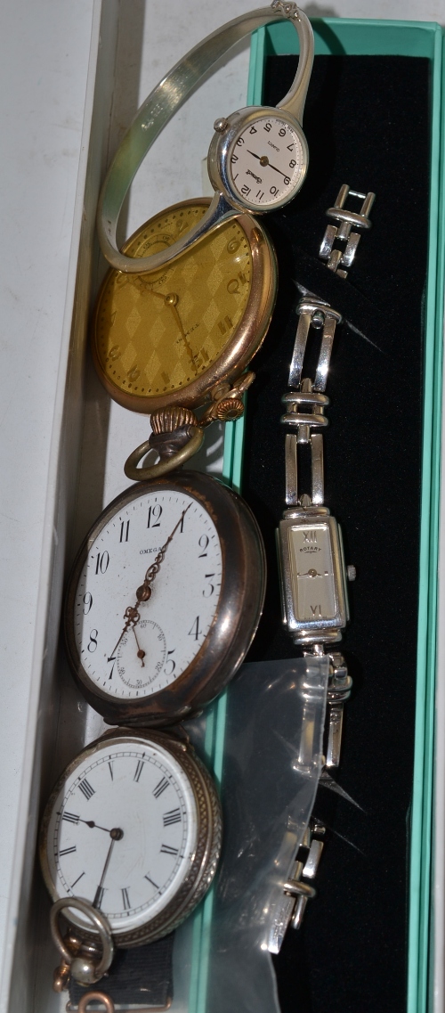 An open faced pocket watch signed Omega, case stamped `0.800`, gold plated Tempo pocket watch, fob
