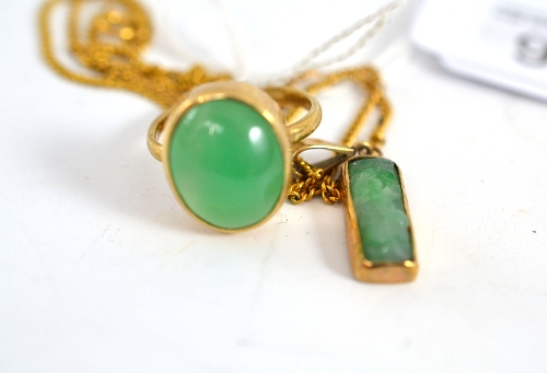 A jade ring and a jade pendant on chain