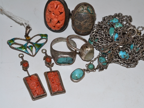 An enamelled pendant by Charles Horner, a scarab ring, turquoise and coral set jewellery