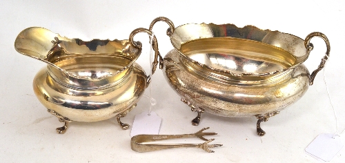 Silver sugar basin and cream jug with sugar nips