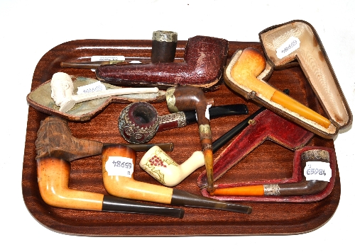 Eleven assorted pipes, some with silver mounts