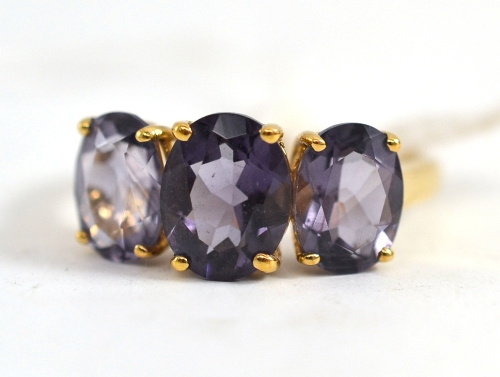 A 9ct gold three stone quartz ring