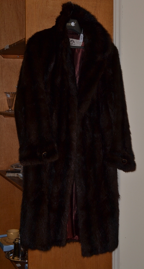 A brown musquash fur coat