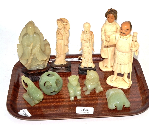 A pair of Japanese bone figures, a pair of Chinese bone figures and six jade type carvings