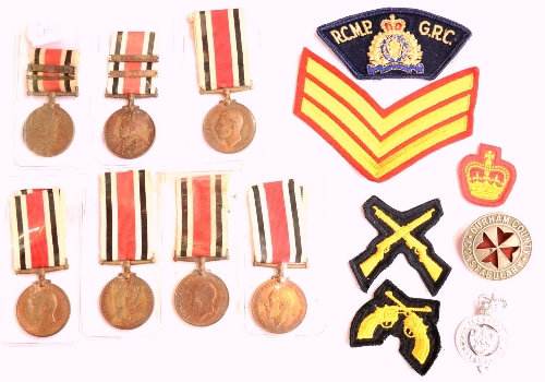 A Collection of Seven Special Constabulary Long Service Medals, comprising two George V, each with