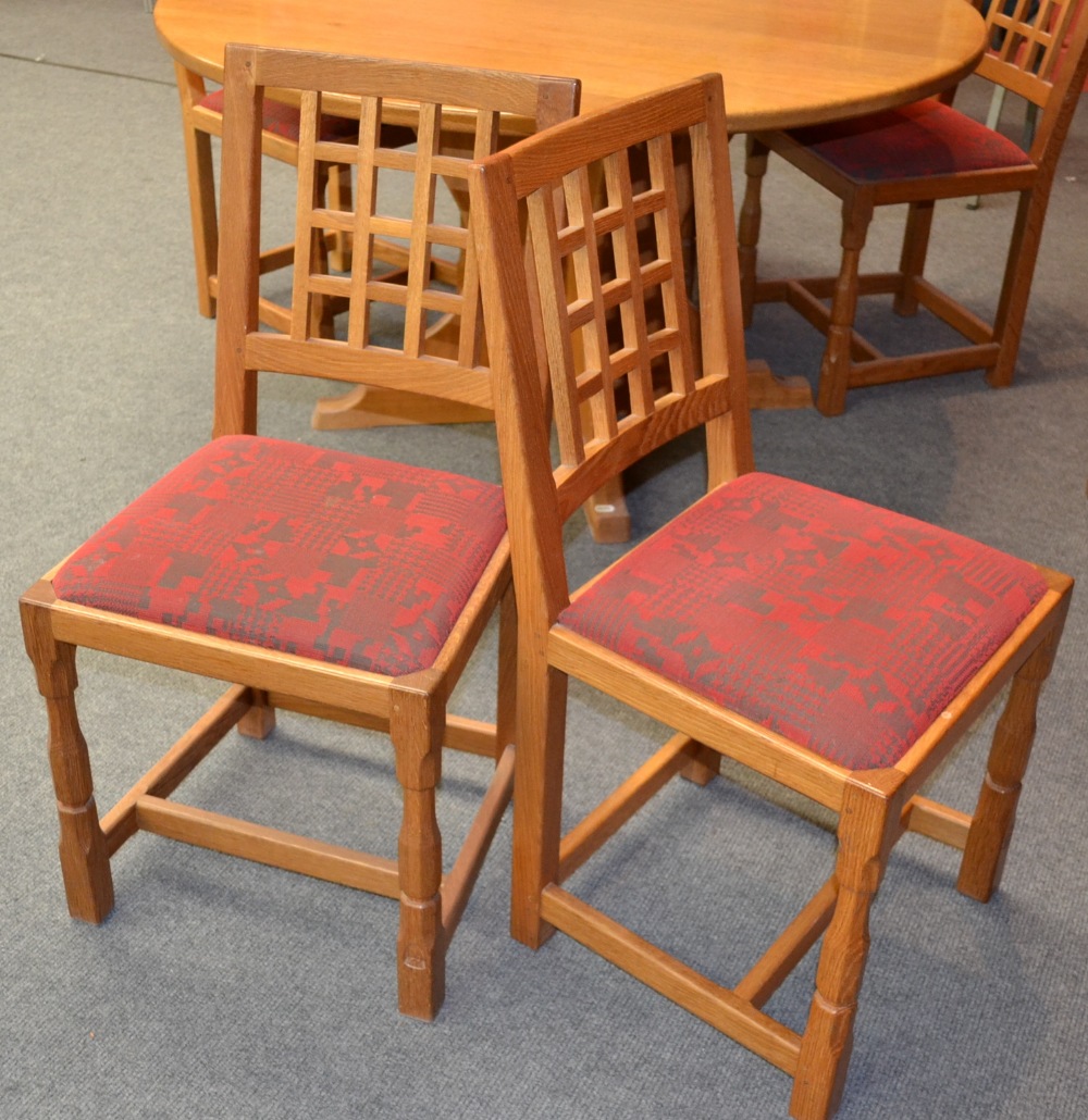 A Set of Six Old Mill Furniture Oak Lattice Back Chairs, drop-in seats, on two turned octagonal