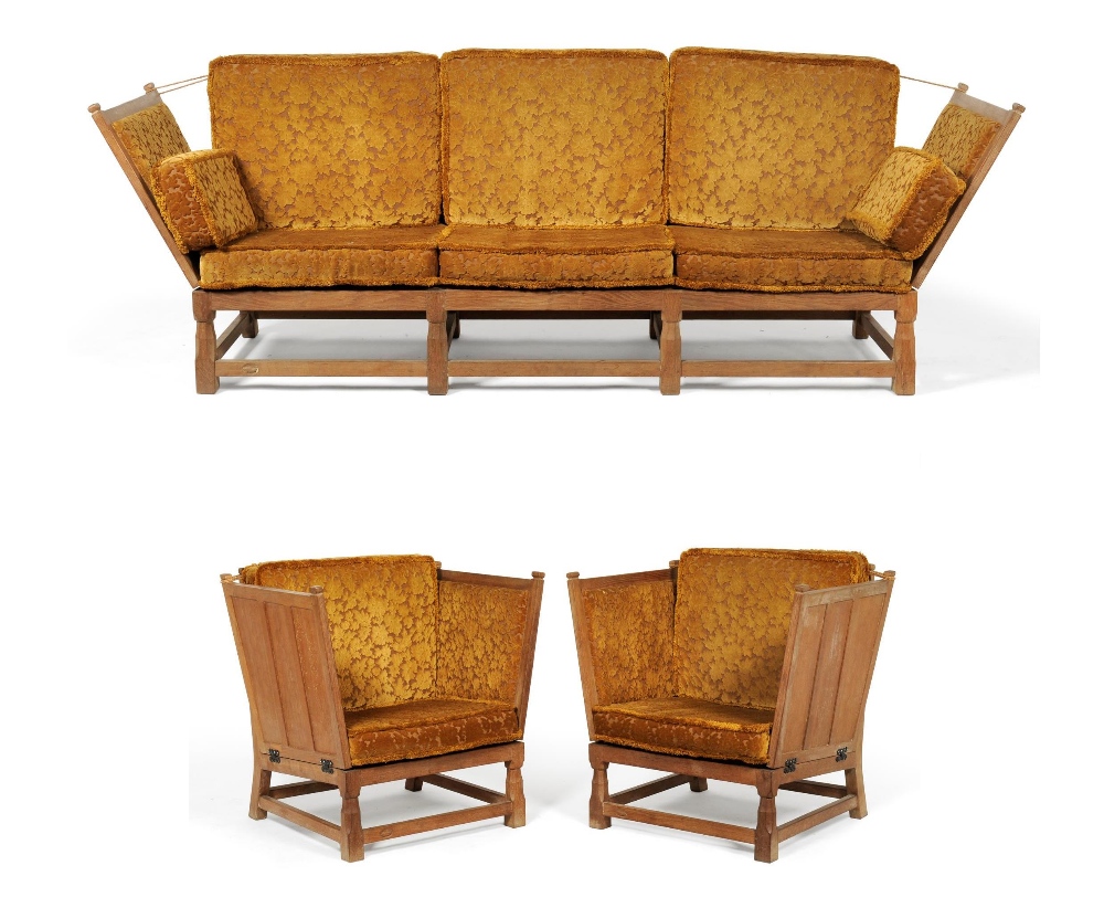 A Derek ``Fishman`` Slater Panelled Oak Three Piece Suite, comprising a sofa, with drop-ends, on