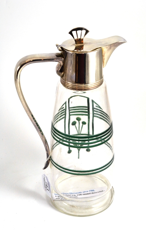 A Secessionist Movement claret jug with green enamel decoration and plated mount, 28cm high