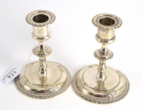 Pair of silver dwarf candlesticks by Robert Garrard, London 1877, 12cm high