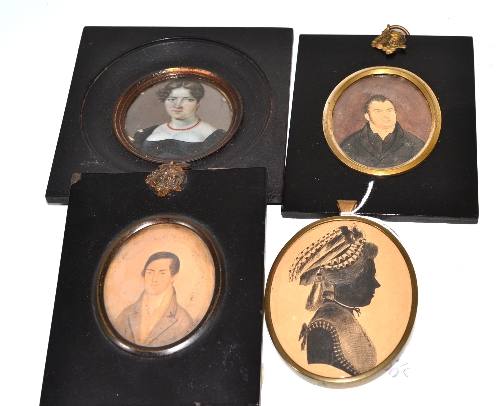 Two miniature portraits of gentleman, on card; a painted silhouette miniature of a lady; a 19th