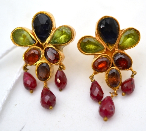 A pair of tourmaline and peridot earrings, the cluster stud inset with peridot and tourmaline, and