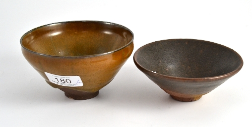A Chinese Jian ware Chawan (tea bowl), of typical form with a thick ochre glaze, 12cm wide; and