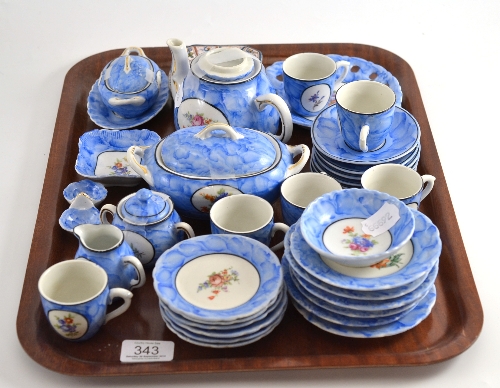 A child`s tea/dinner service and a set of six tin glazed meat dishes for a doll