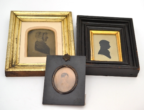 Miniature portrait of a girl, a silhouette portrait of a boy and a silhouette of a lady on glass (