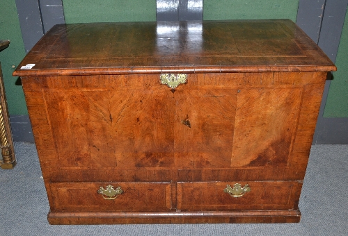 A George II walnut mule chest of typical form with cross-banded sides, top and front, 112cm wide