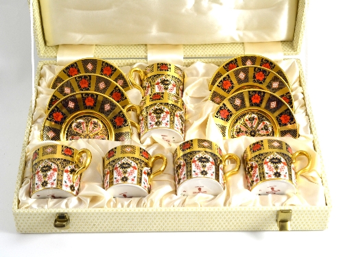 A cased set of six Royal Crown Derby coffee cups and saucers