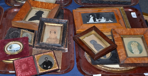 Two trays of 19th century and later portraits, silhouettes, an Indian miniature on ivory,