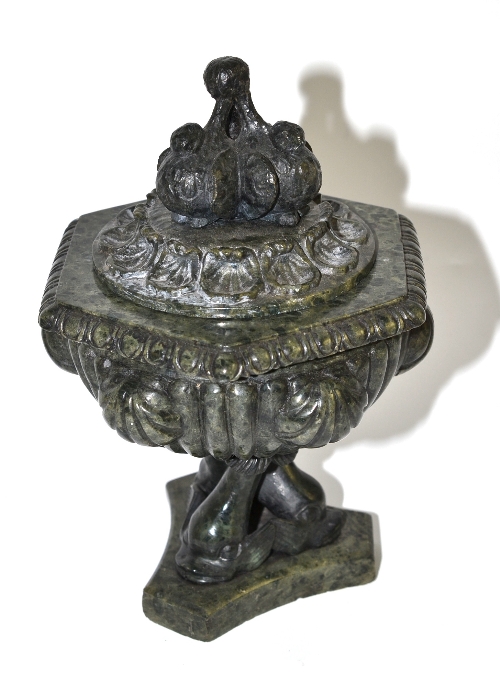 A serpentine marble ink pot and cover of urn form, 18cm high