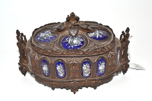 An enamel and cast iron casket, circa 1840, probably French, of oval shape, the hinged cover with