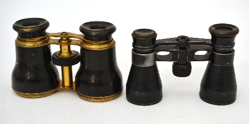 A pair of tortoiseshell opera glasses and a pair of black leather opera glasses (2)