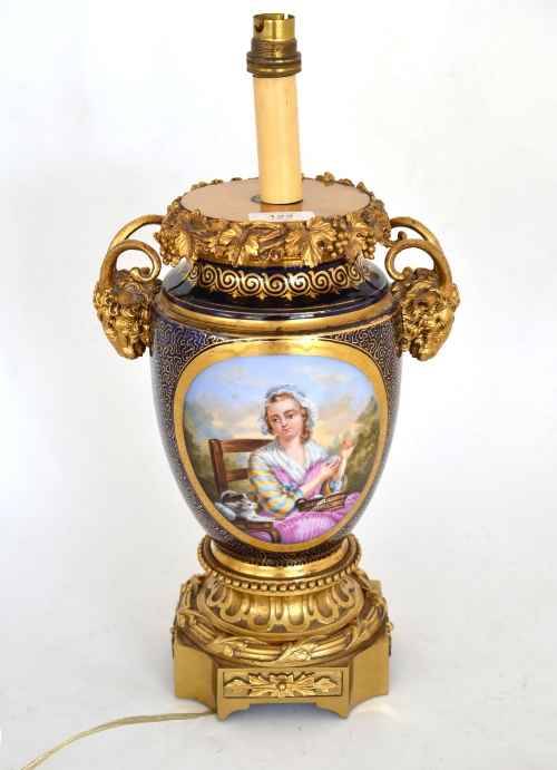 A Continental porcelain and ormolu mounted two-handled vase as a lamp, circa 1880, the semi-ovoid