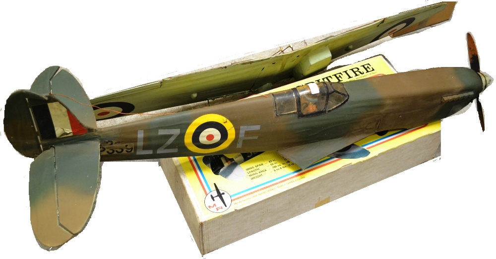 Model Flying Aircraft Of Supermarine Spitfire in camouflage colours with sky blue underside and RAF