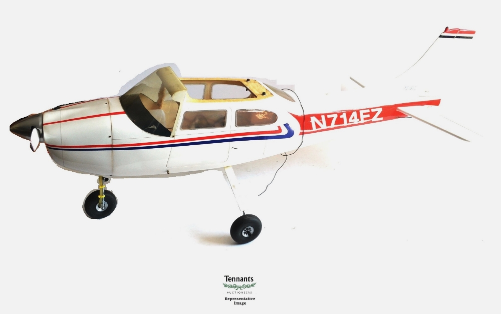 Remote Control Cessna 150M Aircraft, with methanol engine, finished in white with red/blue lining,