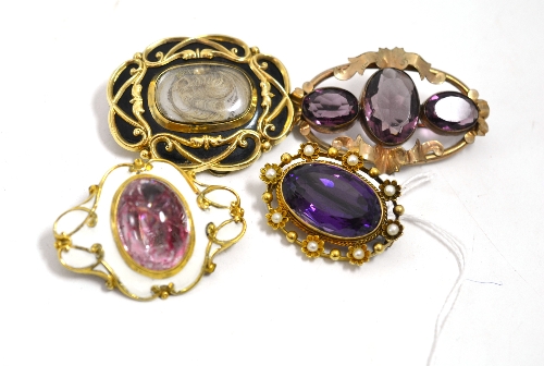 Four Victorian/early 20th century brooches, including one amethyst and seed pearl set brooch,