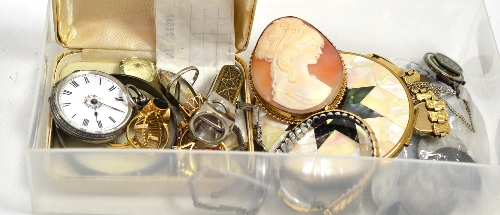 A large cameo brooch, a silver fob watch and assorted coins, gold rings etc