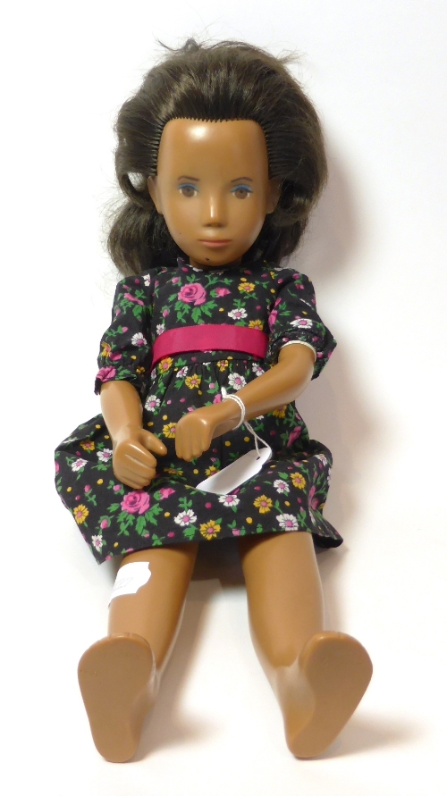 Early Brunette Sasha Doll wearing a floral printed dress, 41cm
