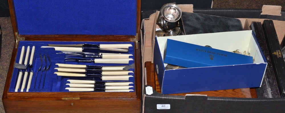 An oak canteen of silver plated Old English pattern tableware, two cased part sets of tea knives