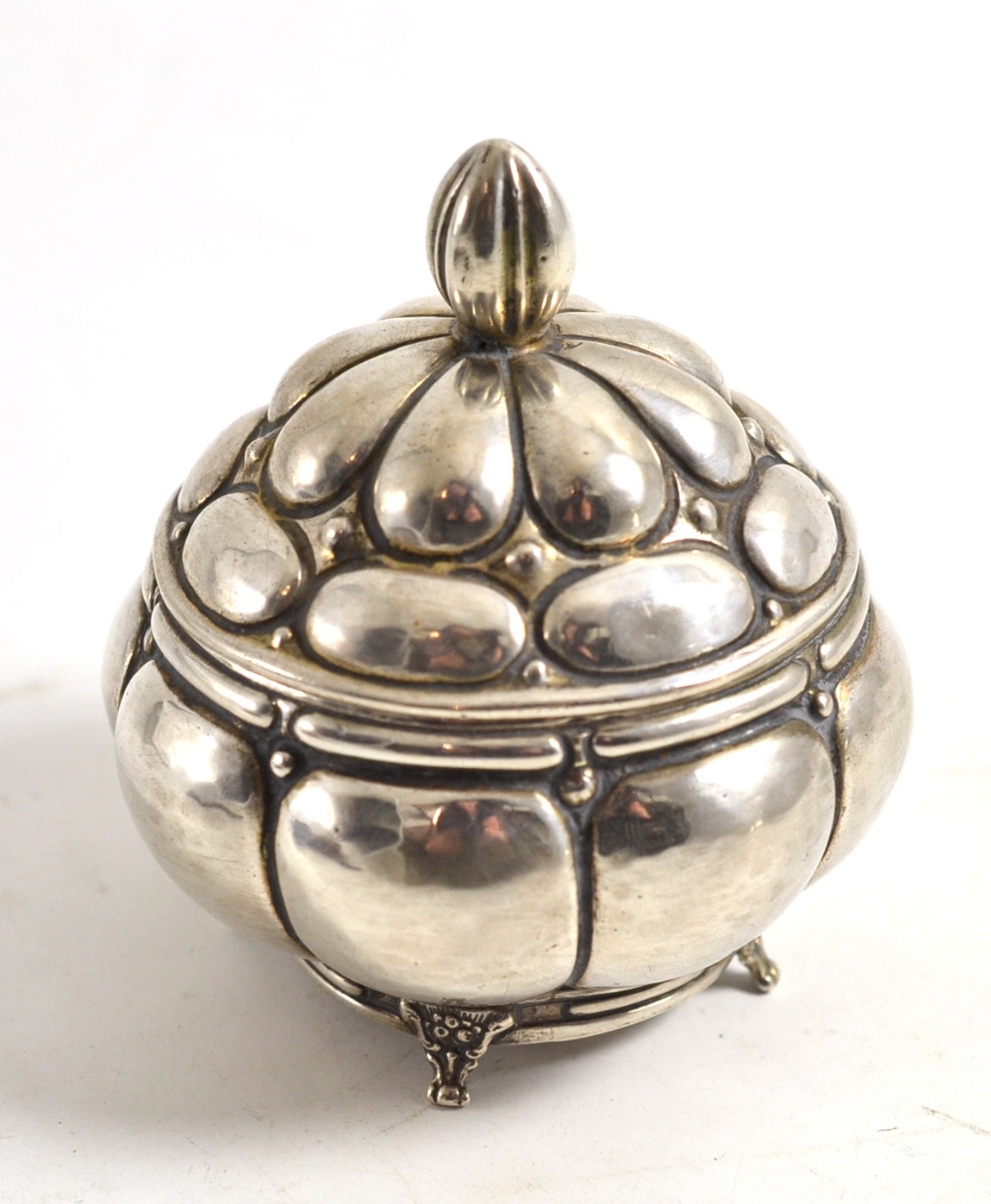 A Russian pumpkin shaped box and cover, bears Russian silver marks