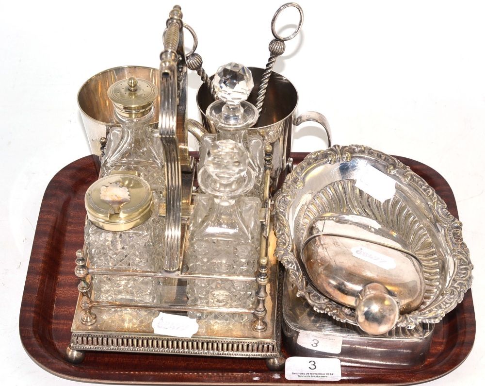 A plated four bottle cruet, two plated mugs, a hip flask, a sandwich box, grape scissors and dish