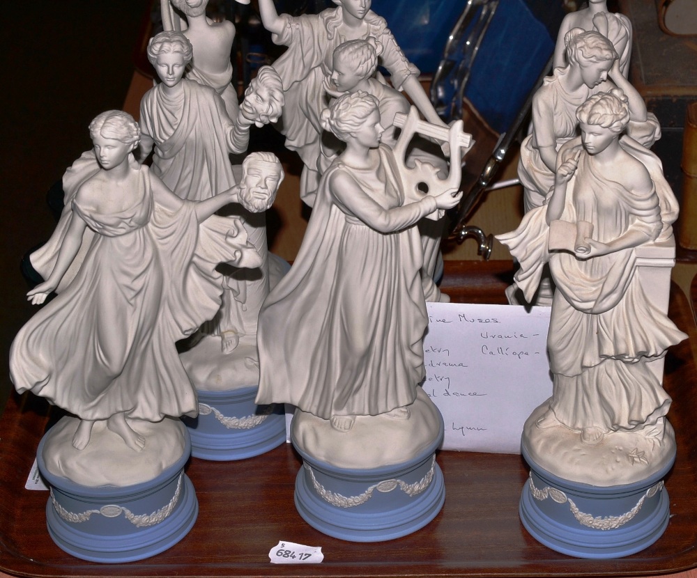 A set of nine Wedgwood ``Classical Muses`` with certificates and a pair of emerald wine glasses