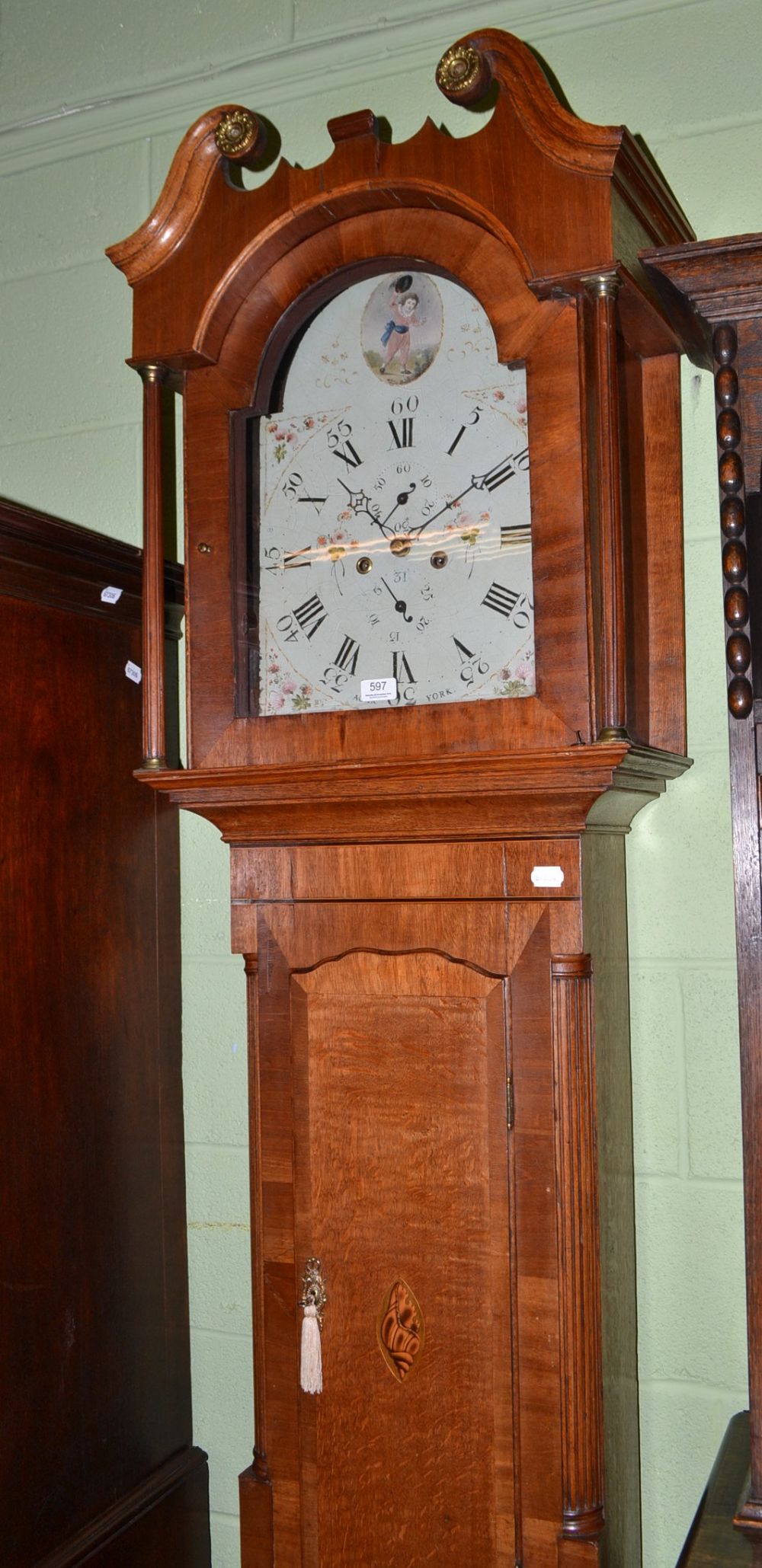 An Agar of York oak and mahogany eight day longcase clock