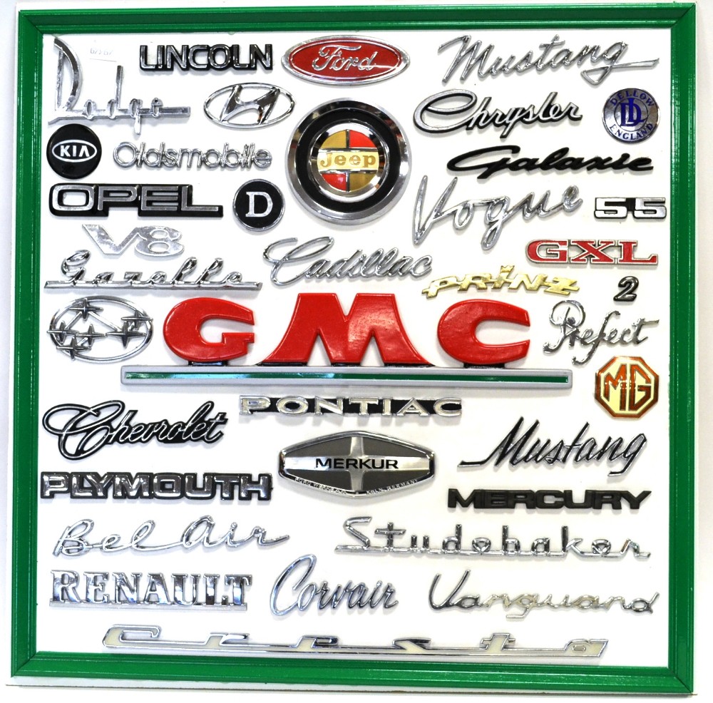 Car Badges a collection of assorted makes including Lincoln, Dodge, Chrysler, Vogue, Cadillac,