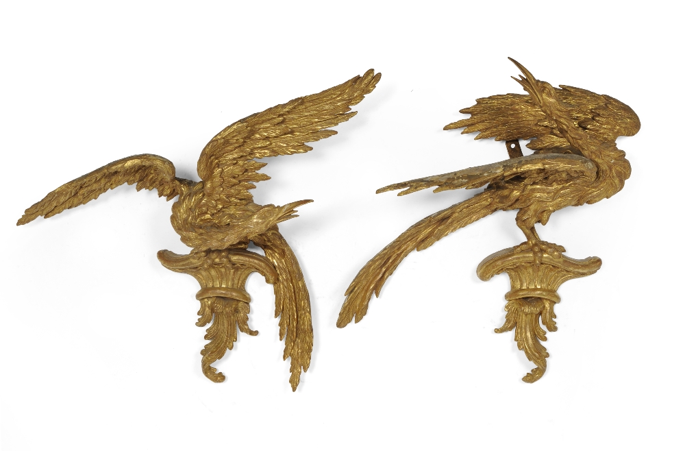 A Pair of 18th Century Carved Giltwood Ho-Ho Birds, realistically modelled with outswept wings,