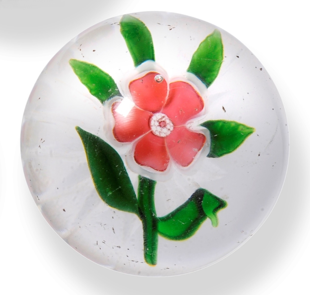 A Clichy Flower Paperweight, circa 1850, the pink and white petal flower with green leaves, 6.9cm