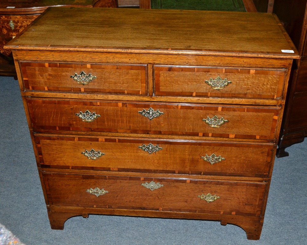 An English Oak and Yewwood Crossbanded Straight Front Chest of Drawers, basically 18th century, the
