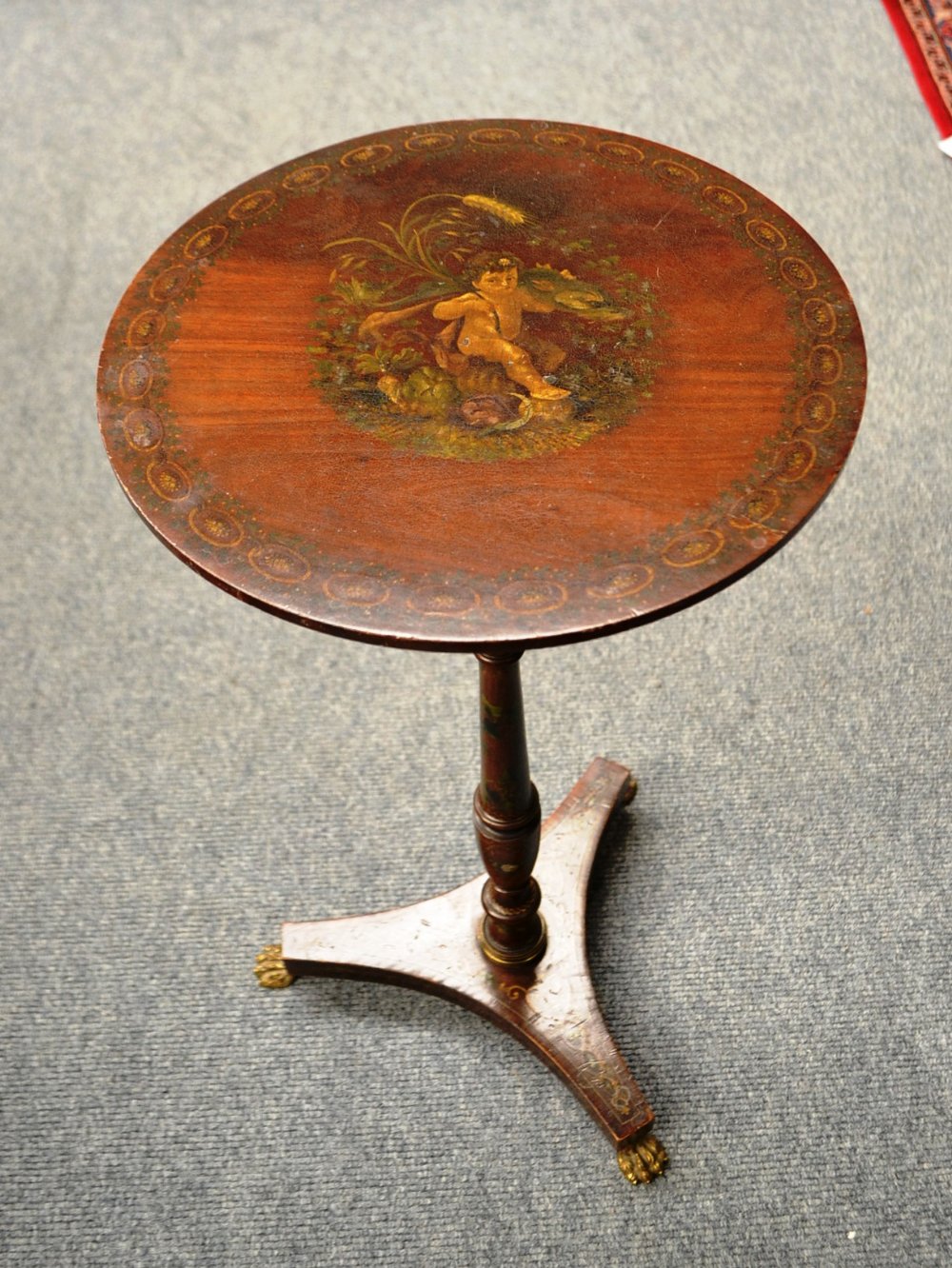 A Satinwood and Polychrome Decorated Tripod Table, in George III style, the top decorated with a