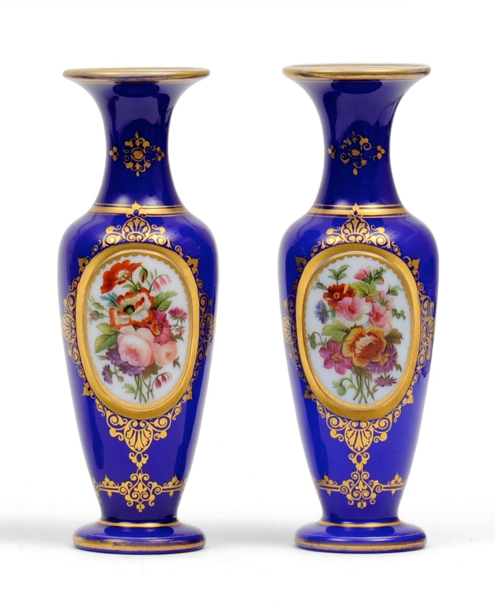 A Pair of Baccarat Blue Overlay White Glass Vases, mid 19th century, of baluster form, painted with