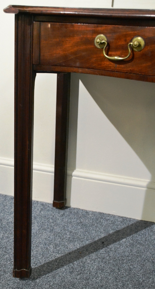 A George III Mahogany Side Table, of serpentine form, the moulded top with eared corners above a - Image 6 of 7