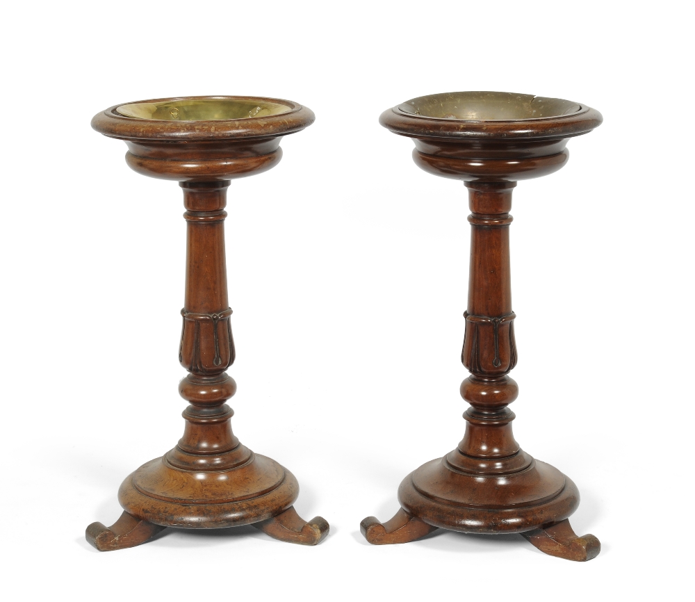 A Pair of Early Victorian Carved Mahogany Jardinières, circa 1840, the circular dished tops above