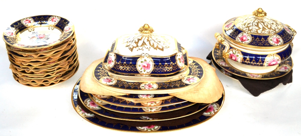 A Chamberlains Worcester Porcelain Dinner Service, circa 1820, painted with flower sprays within